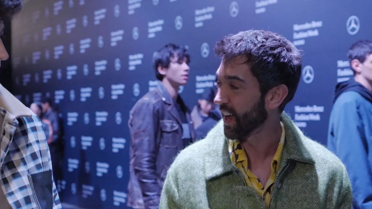 Pablo Erroz in front of the Mercedes-Benz Fashion Week Madrid backdrop